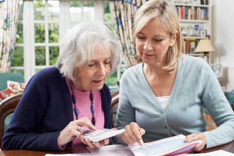 women sitting with tax client